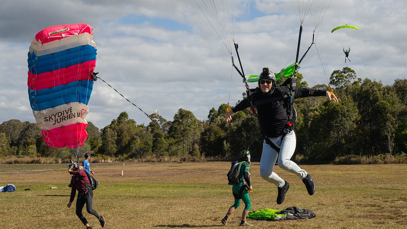 A jumper running out a canopy landing on the drop zone