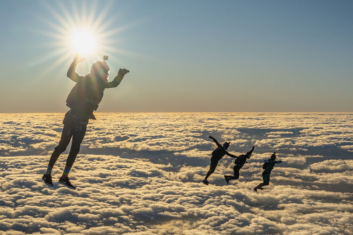 Flyers above a solid deck of cloud