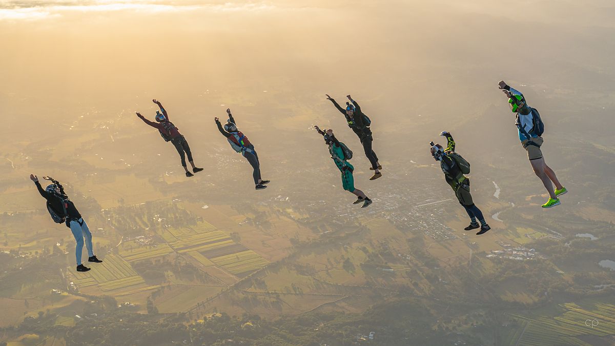 Flyers strung out in low golden sun
