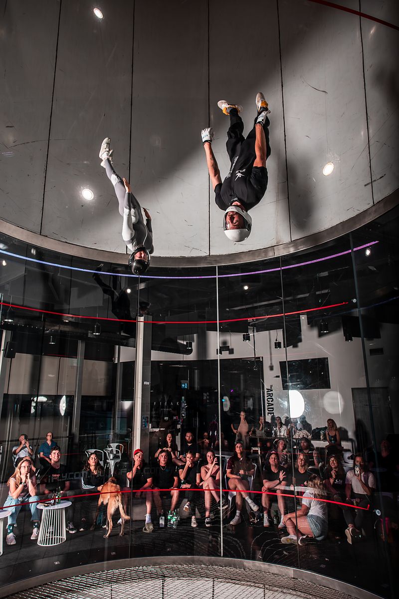 A flyer head-down in the wind tunnel