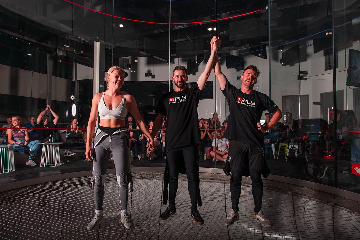 A competitor's hand raised at the end of a match