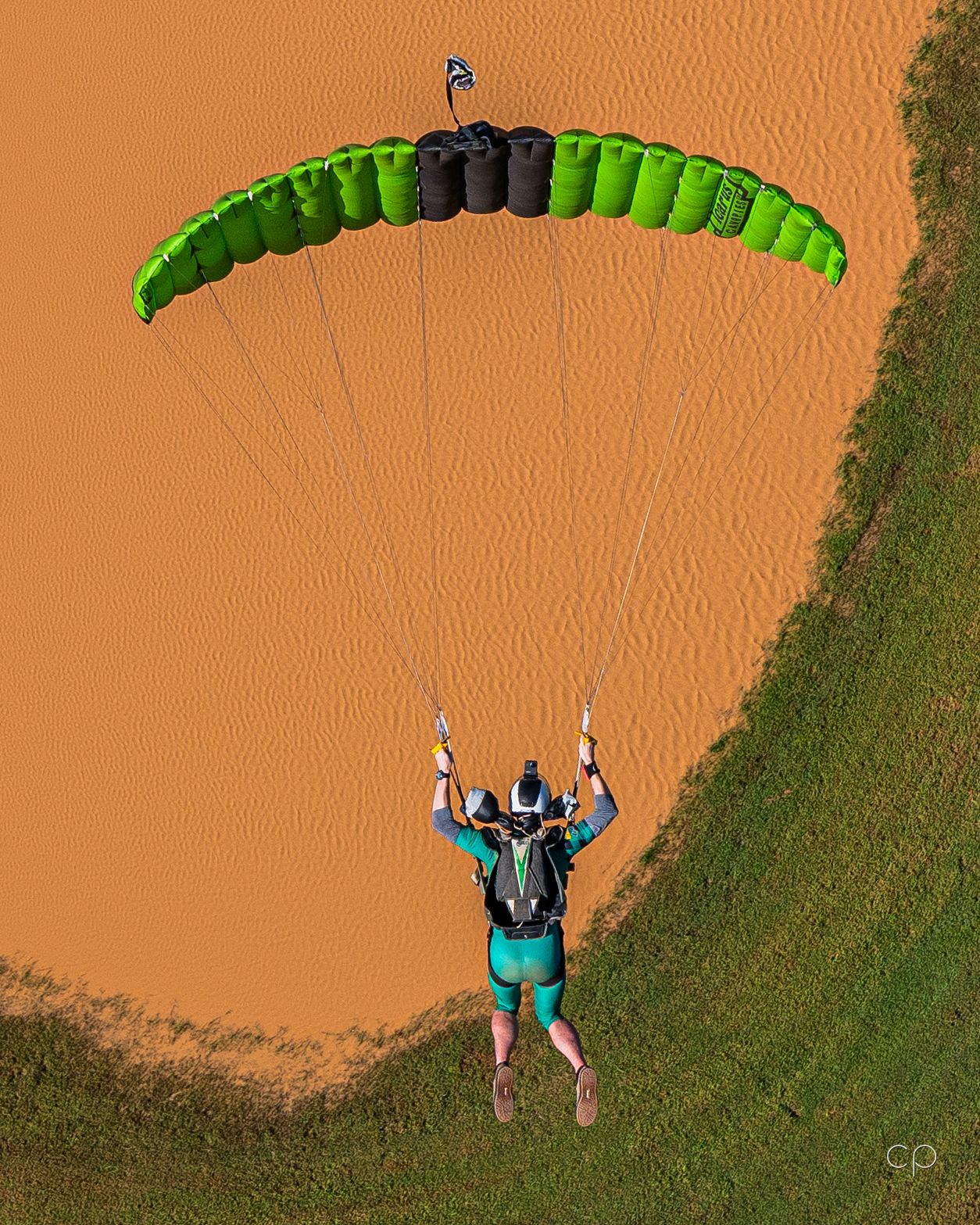 Canopy on approach, red dirt below