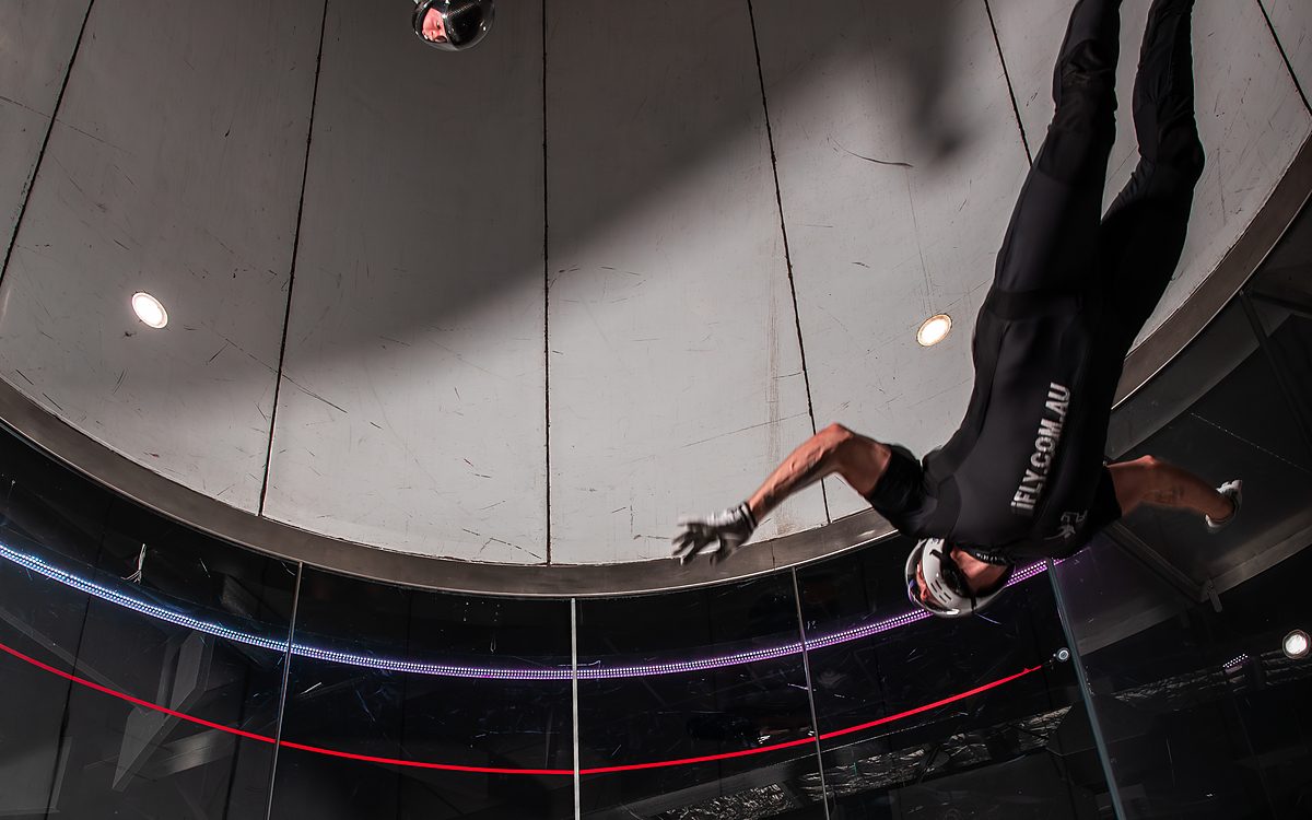 A flyer working the tunnel chamber during a coaching session